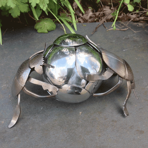 Dung beetles made from recycled metal